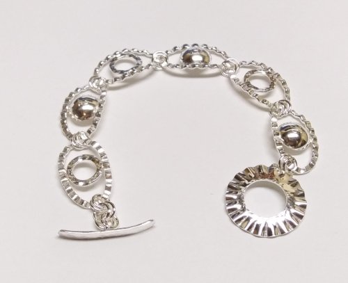 Judy Larson's Ripple Bracelet  - , Metalwork, Cutting, Cutting Tool, Cutters, Dapping, Dapping Jewelry, Filing, Finishing, Findings, Clasps, Components, Tumbling, Tumble, Tumbling Jewelry, Butane Torch, Soldering, Solder, Tools,  Tumble the bracelet to polish and work harden it.